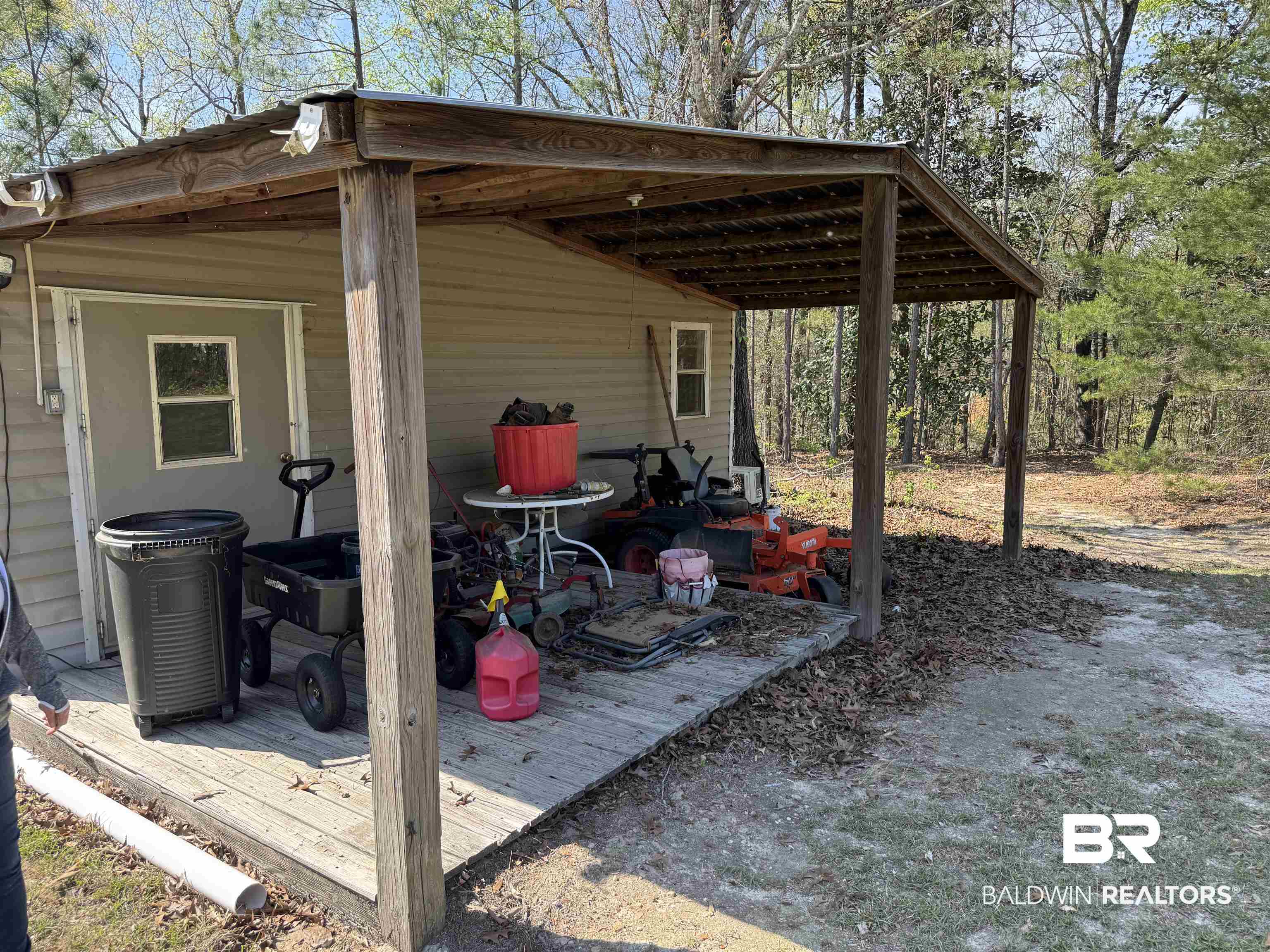 516 Mill Creek Road Frisco City, AL 36445 - Photo 3 of 32 View of patio / terrace featuring a wooden deck