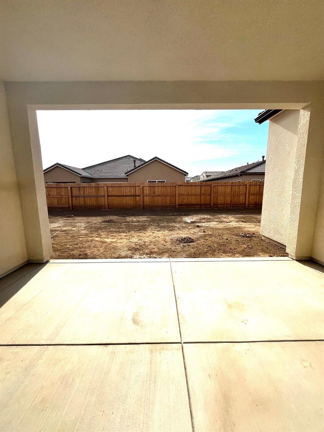 682 Bloom Lane Clovis, CA 93619 - Photo 23 of 30 a bathroom with a sink and a large mirror