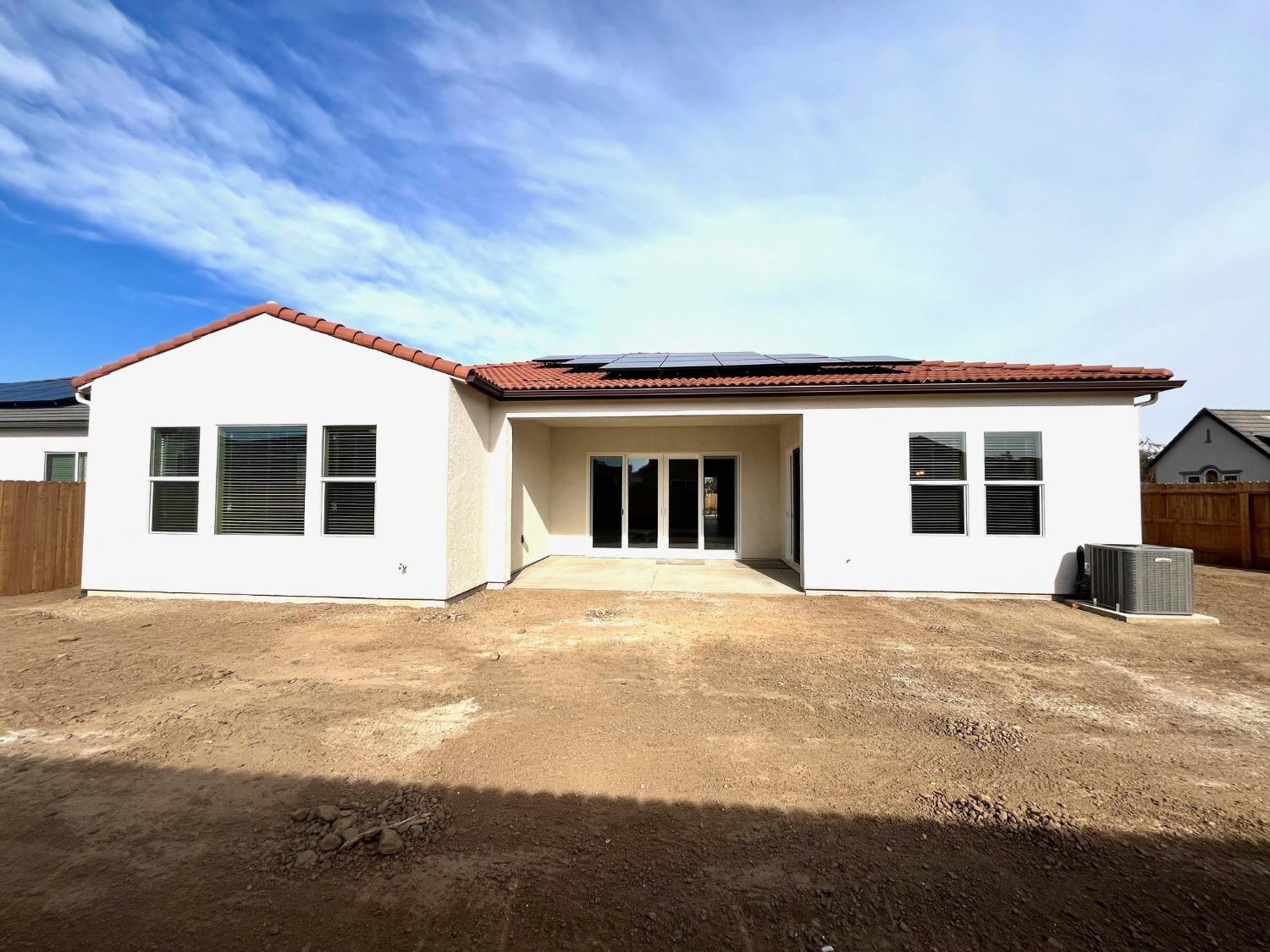 682 Bloom Lane Clovis, CA 93619 - Photo 24 of 30 a view of a house with a patio