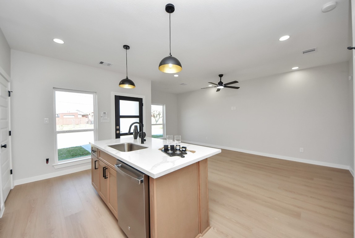 9826 Nedwald Street Houston, TX 77029 - Photo 18 of 50 a bathroom with a sink a vanity and a mirror