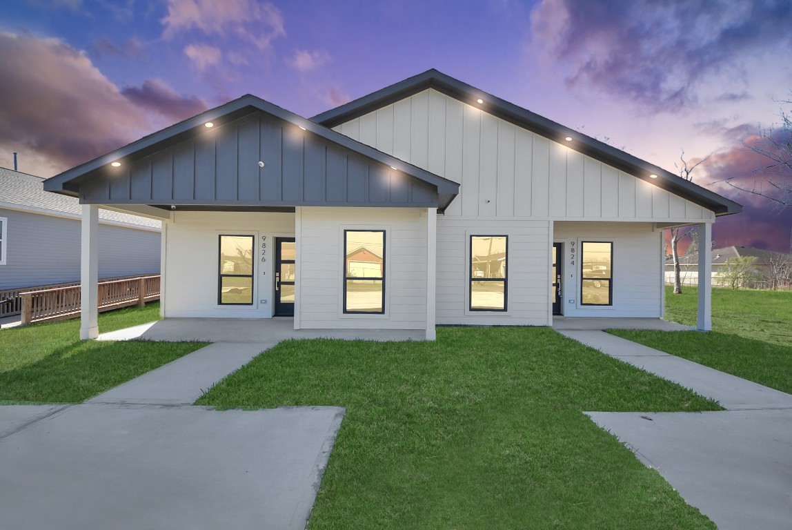 9826 Nedwald Street Houston, TX 77029 - Photo 2 of 50 a front view of a house with a yard