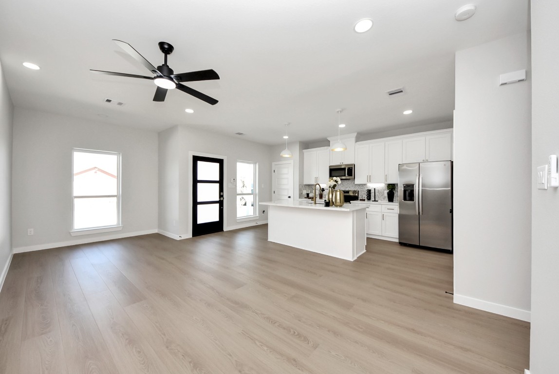 9826 Nedwald Street Houston, TX 77029 - Photo 25 of 50 a view of a kitchen with a sink and a window