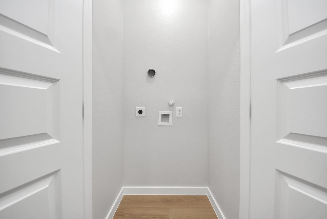 9826 Nedwald Street Houston, TX 77029 - Photo 37 of 50 a view of small space with racks on the wall