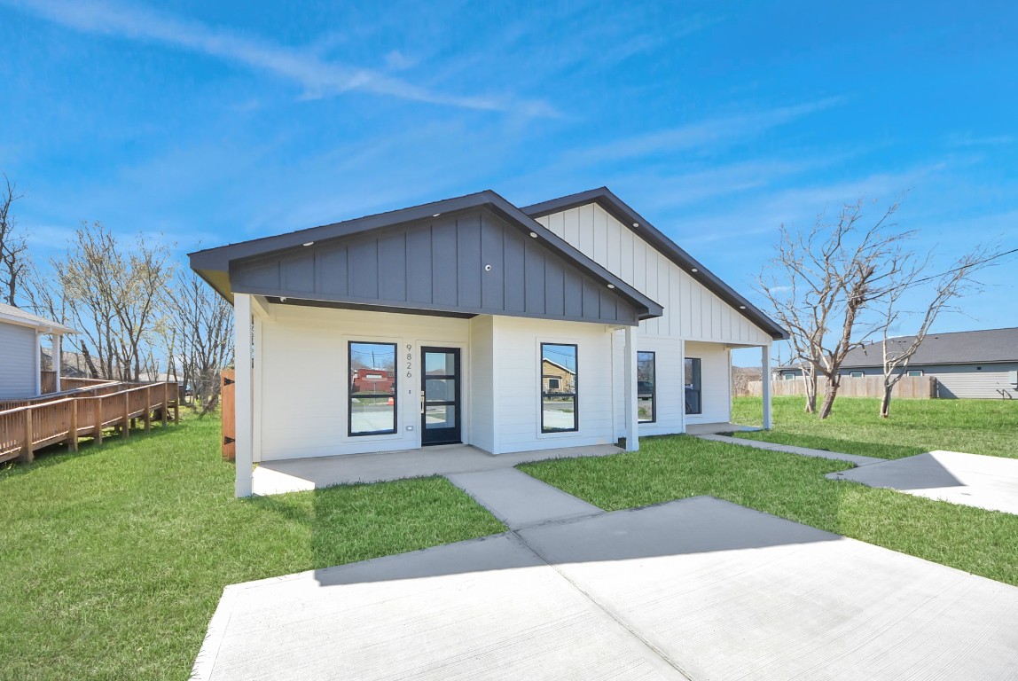 9826 Nedwald Street Houston, TX 77029 - Photo 4 of 50 a house view with a garden space