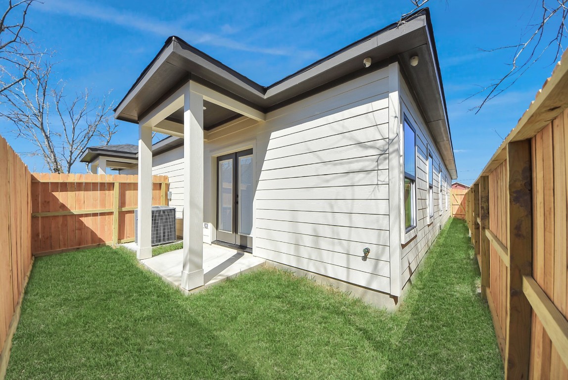 9826 Nedwald Street Houston, TX 77029 - Photo 49 of 50 a view of a house with backyard