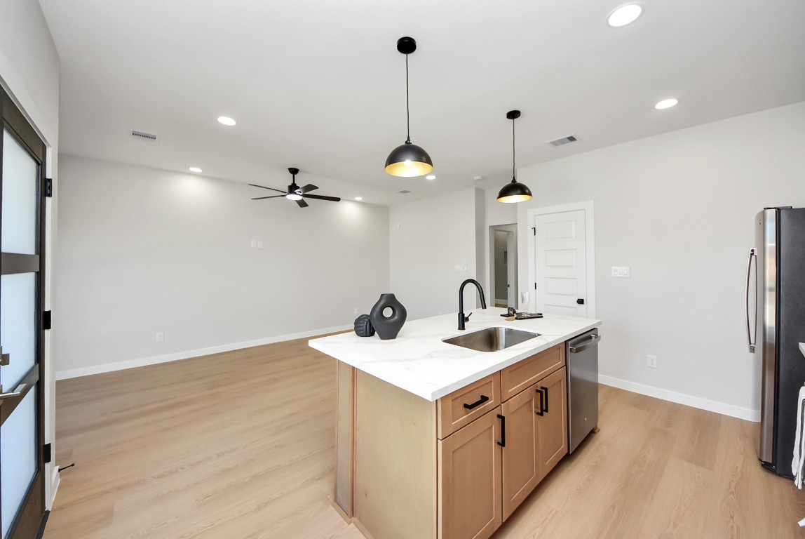 9826 Nedwald Street Houston, TX 77029 - Photo 9 of 50 a bathroom with a sink vanity and a mirror