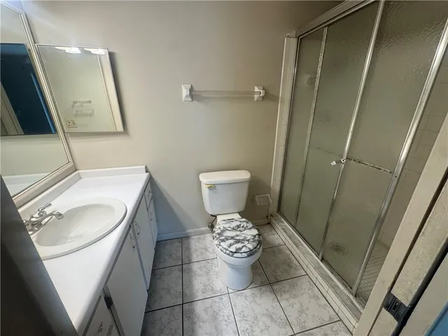 a bathroom with a toilet and a sink