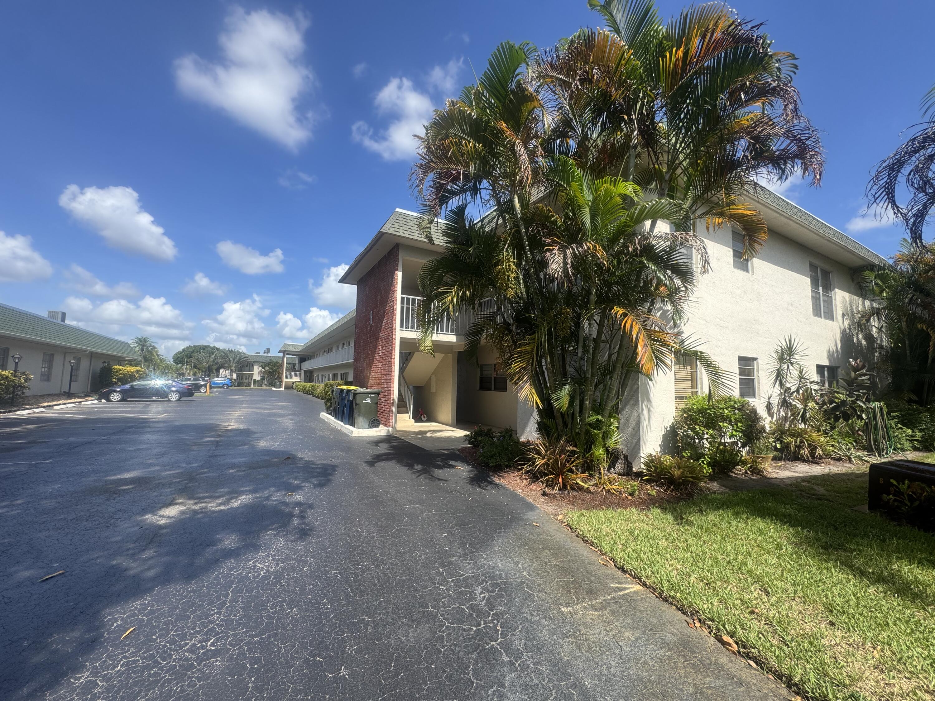 1900 South Kanner Highway, Unit 8205 Stuart, FL 34994 - Photo 7 of 20 a view of a street with a building in the background