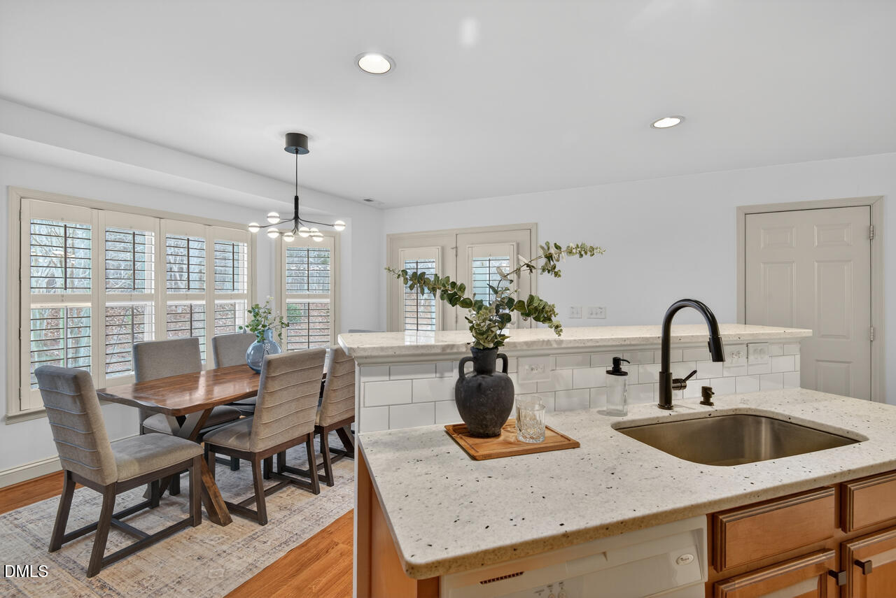 548 Abbey Fields Loop Morrisville, NC 27560 - Photo 11 of 29 a dining room with furniture and window