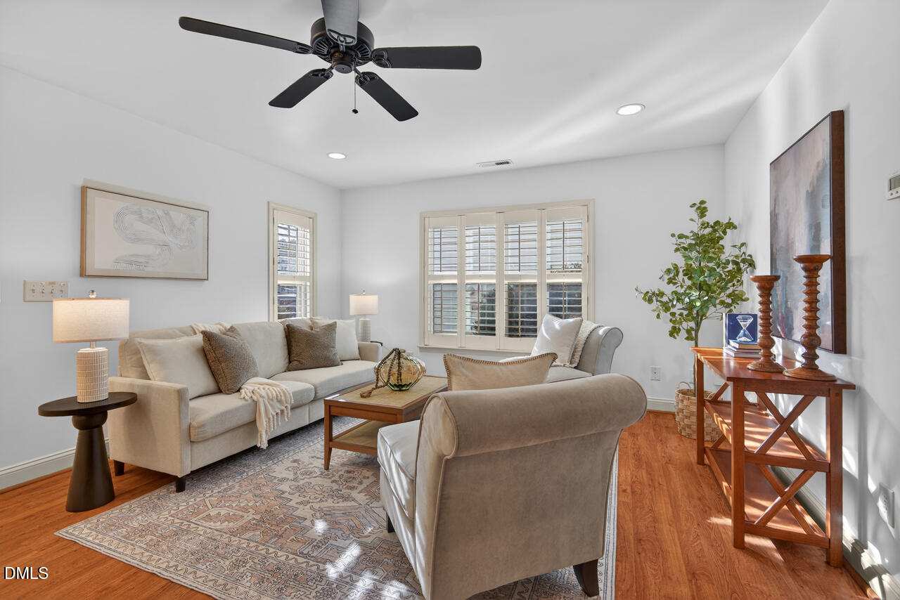 548 Abbey Fields Loop Morrisville, NC 27560 - Photo 5 of 29 a living room with furniture and a large window