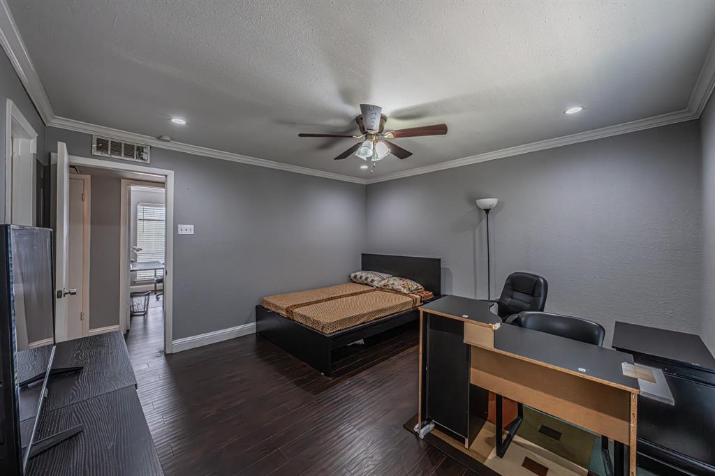 1807 East Grauwyler Road, Unit 124 Irving, TX 75061 - Photo 17 of 22 a room with gym equipment and wooden floor