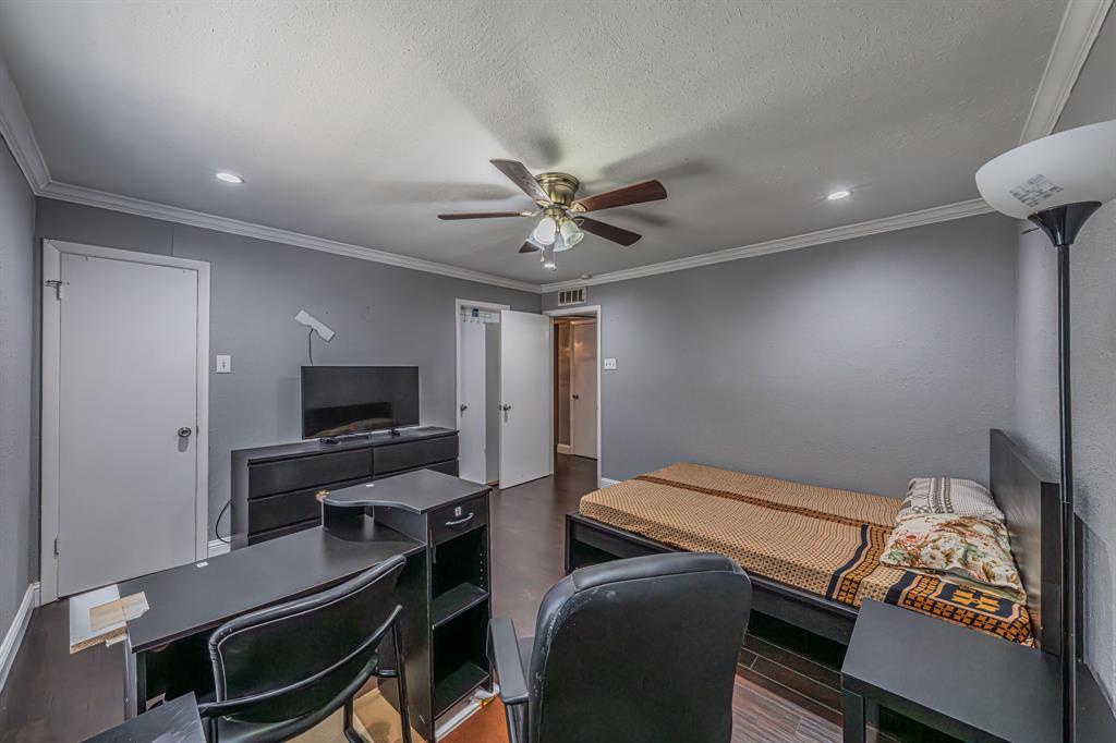 1807 East Grauwyler Road, Unit 124 Irving, TX 75061 - Photo 18 of 22 a bedroom with a workspace