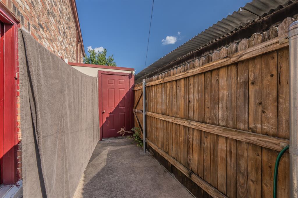 1807 East Grauwyler Road, Unit 124 Irving, TX 75061 - Photo 20 of 22 a view of a pathway of a building