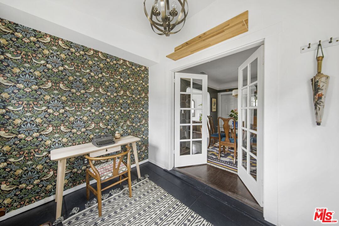 2035 Summit Avenue Pasadena, CA 91103 - Photo 13 of 27 a view of a hallway with wooden floor and a potted plant