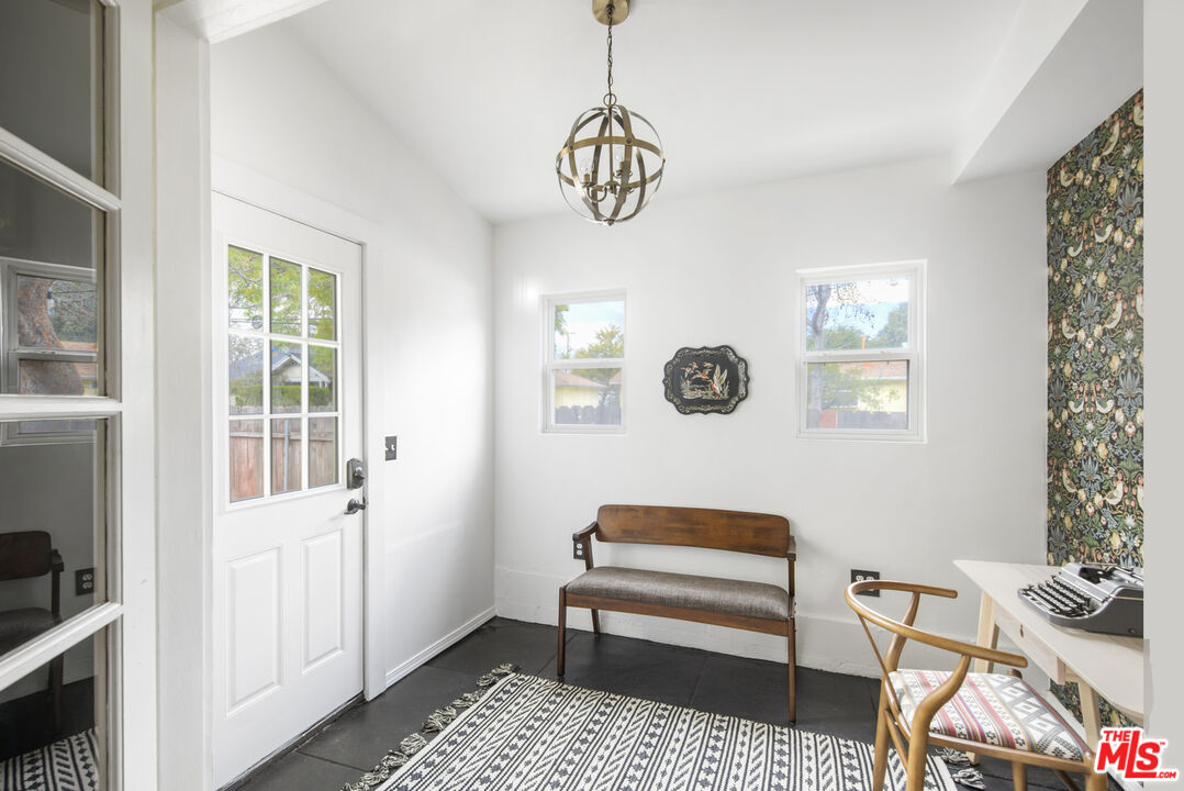 2035 Summit Avenue Pasadena, CA 91103 - Photo 14 of 27 a bedroom with a bed and a window