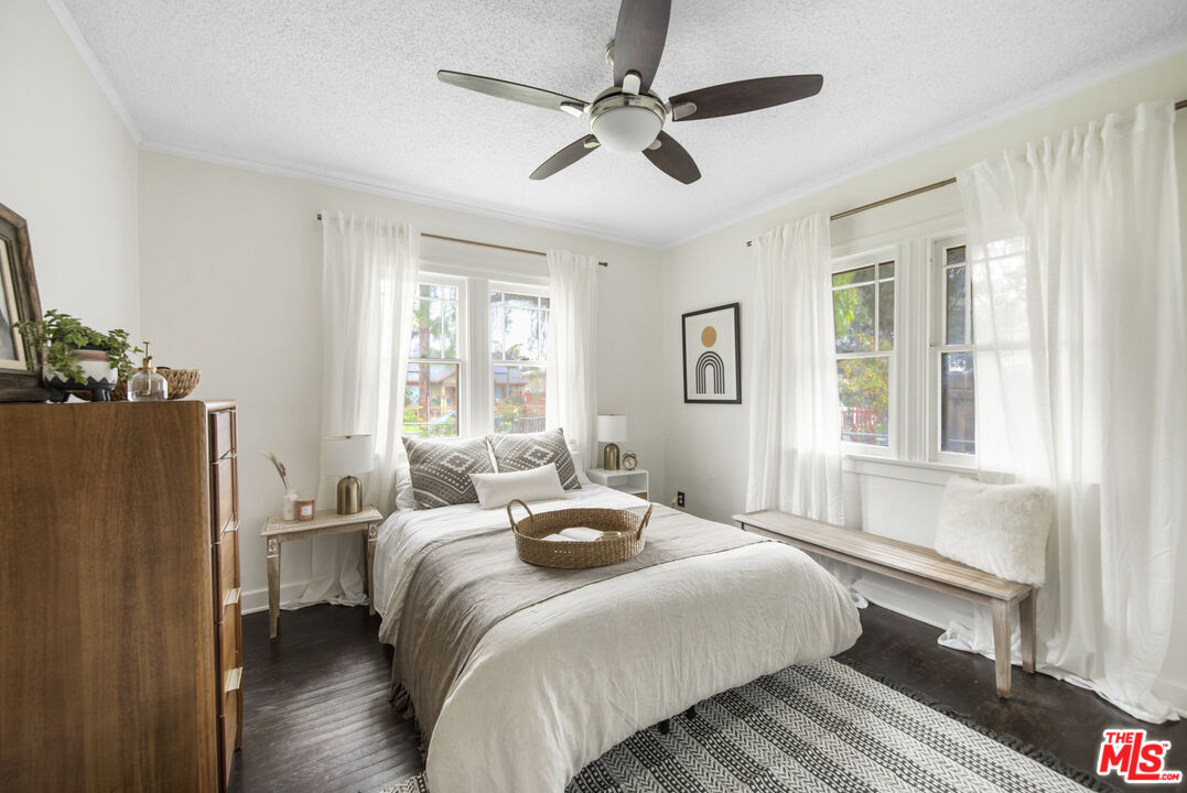 2035 Summit Avenue Pasadena, CA 91103 - Photo 15 of 27 a bedroom with a bed furniture and a window