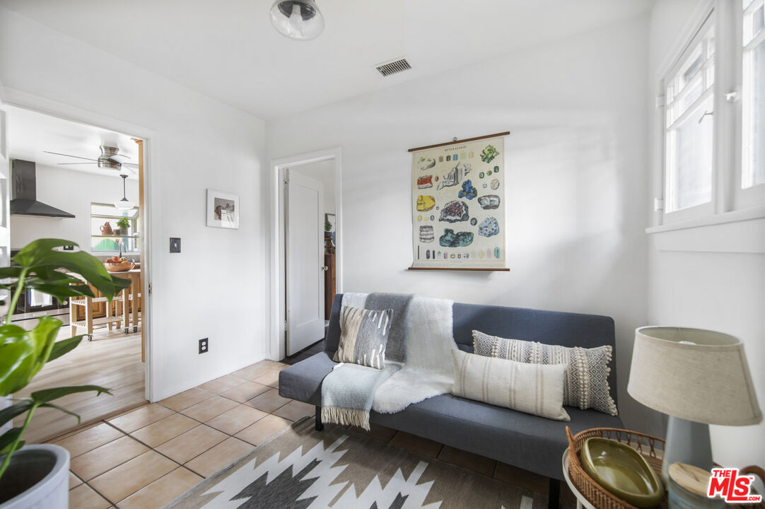 2035 Summit Avenue Pasadena, CA 91103 - Photo 22 of 27 a living room with furniture and wooden floor