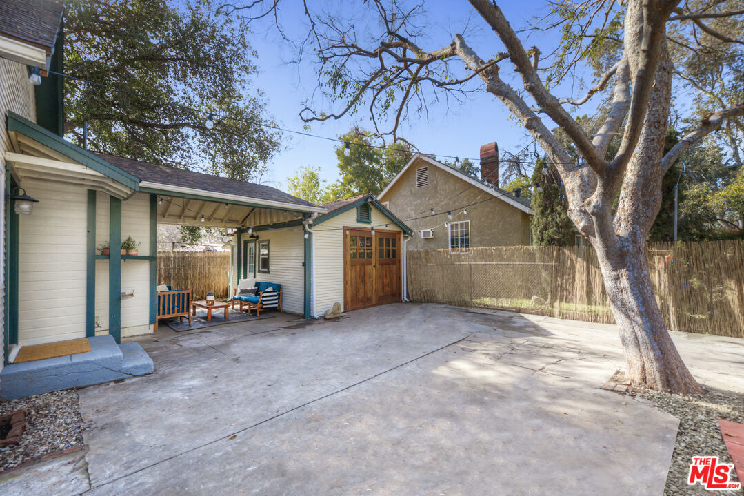 2035 Summit Avenue Pasadena, CA 91103 - Photo 27 of 27 a view of a house with a yard and large tree