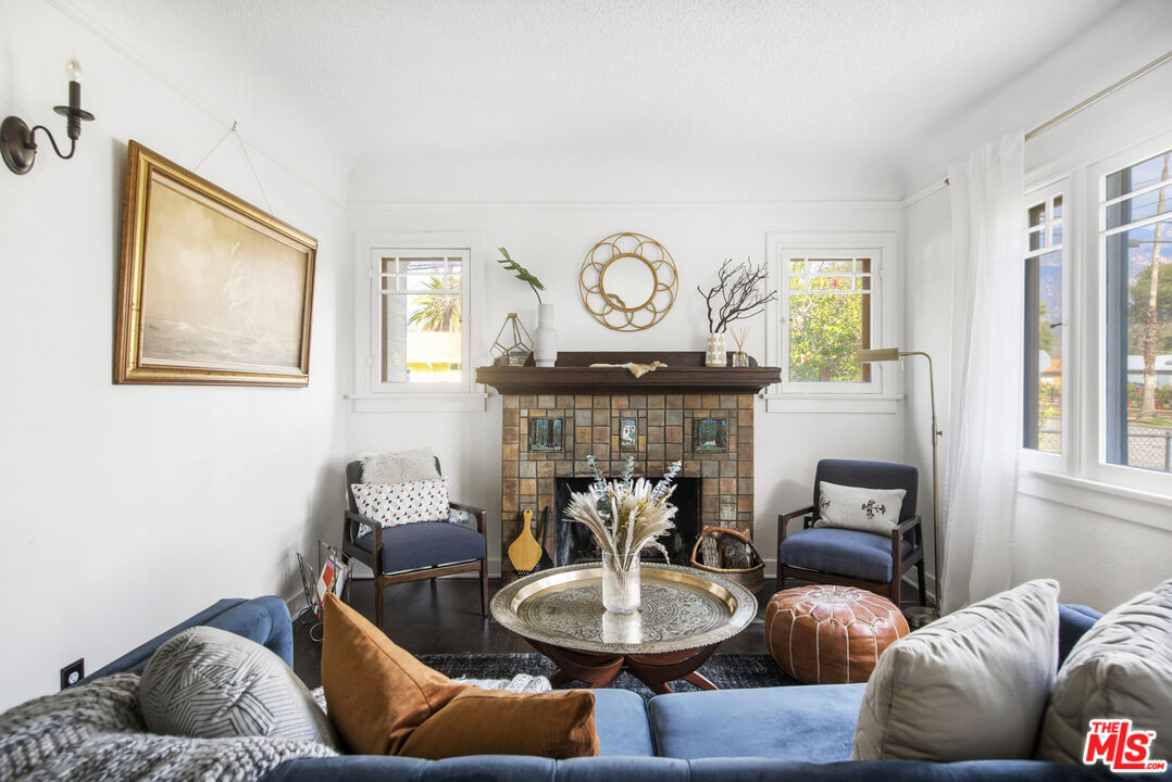 2035 Summit Avenue Pasadena, CA 91103 - Photo 4 of 27 a living room with furniture and a fireplace