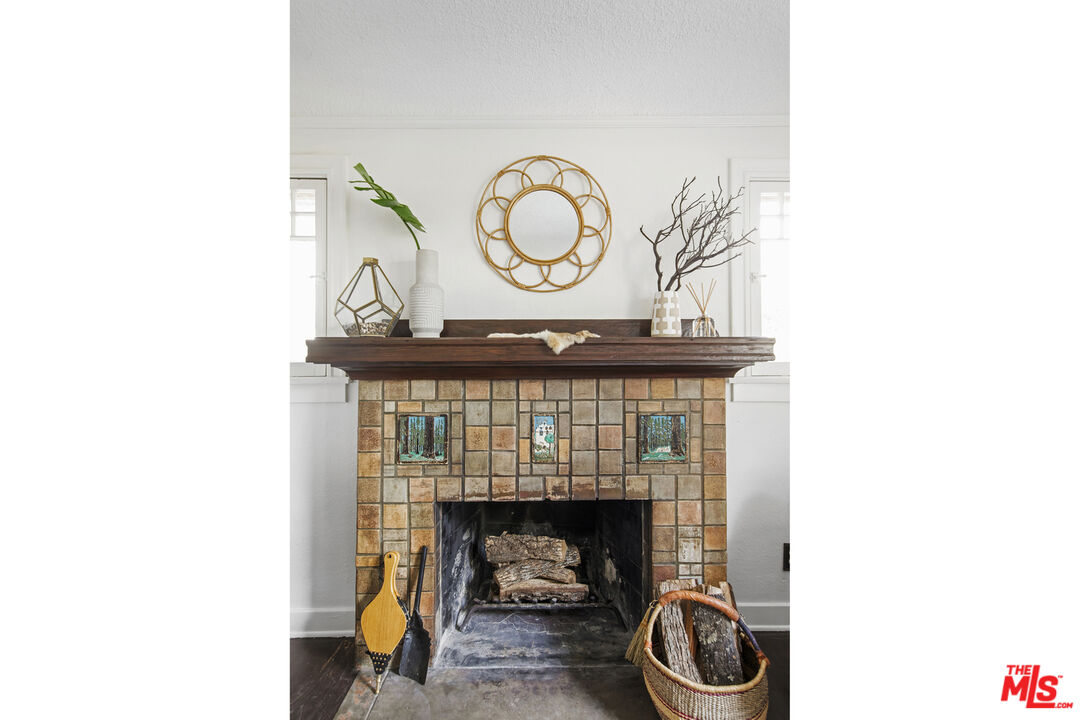 2035 Summit Avenue Pasadena, CA 91103 - Photo 5 of 27 a living room with furniture and a fireplace