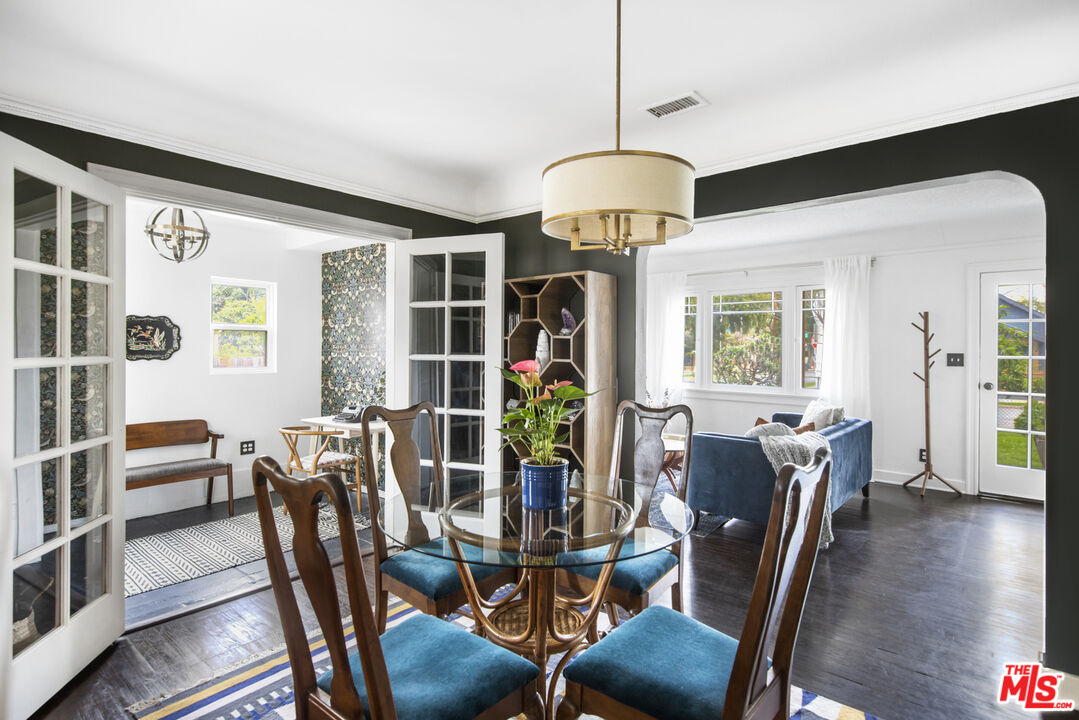 2035 Summit Avenue Pasadena, CA 91103 - Photo 6 of 27 a view of a dining room with furniture window and wooden floor