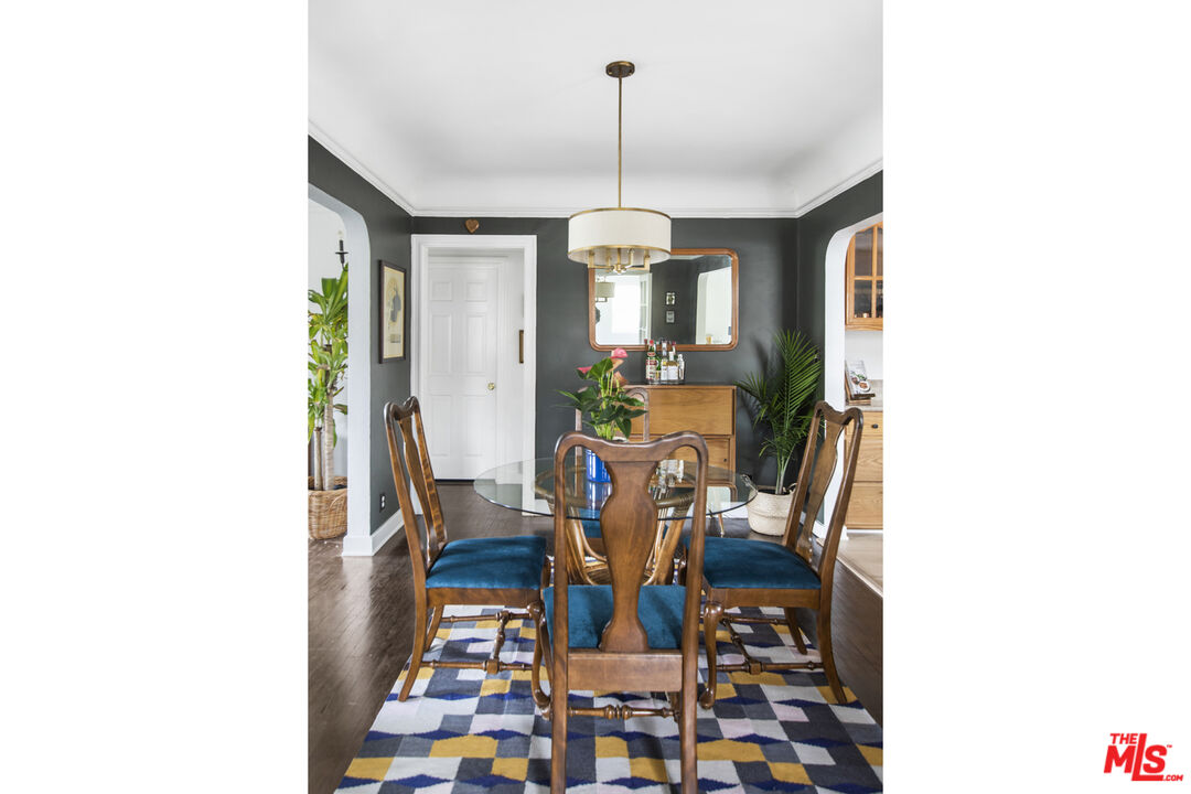 2035 Summit Avenue Pasadena, CA 91103 - Photo 8 of 27 a view of a dining room with furniture and chandelier