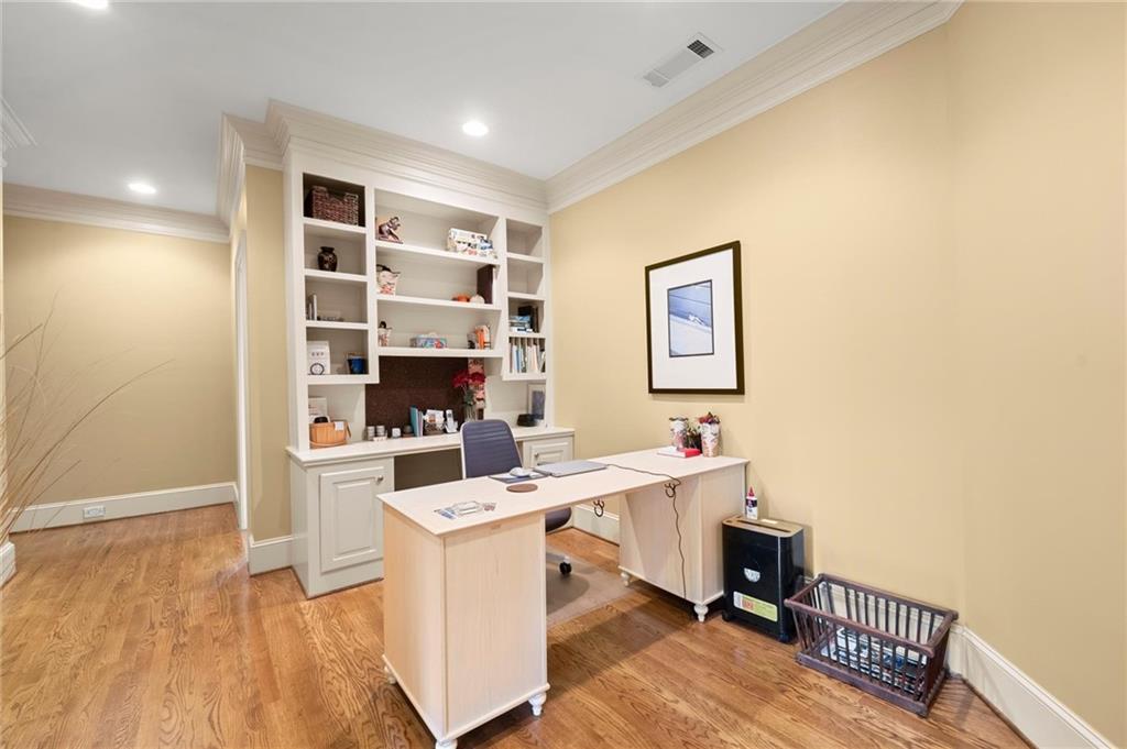 322 Edwards Brook Lane Canton, GA 30115 - Photo 53 of 99 a view of a workspace with furniture and wooden floor