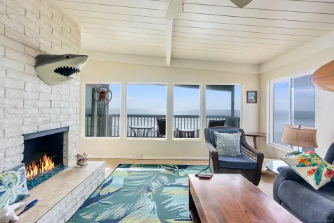 a bedroom with furniture and a fireplace