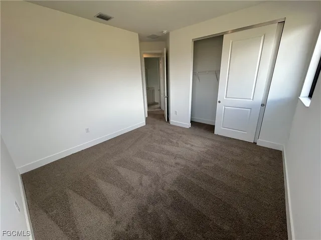 a view of an empty room with window