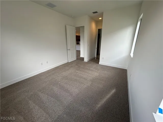 a bathroom with a sink a tub and a mirror