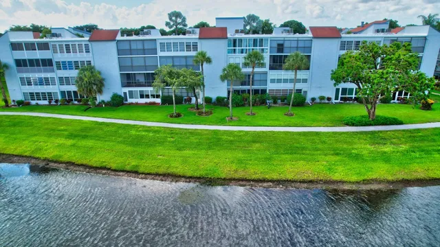 a view of a lake with a yard