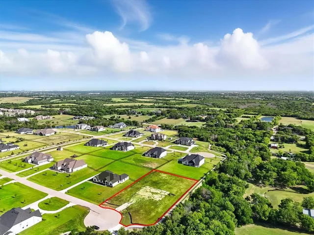 a picture of a room with a white wall and a large window