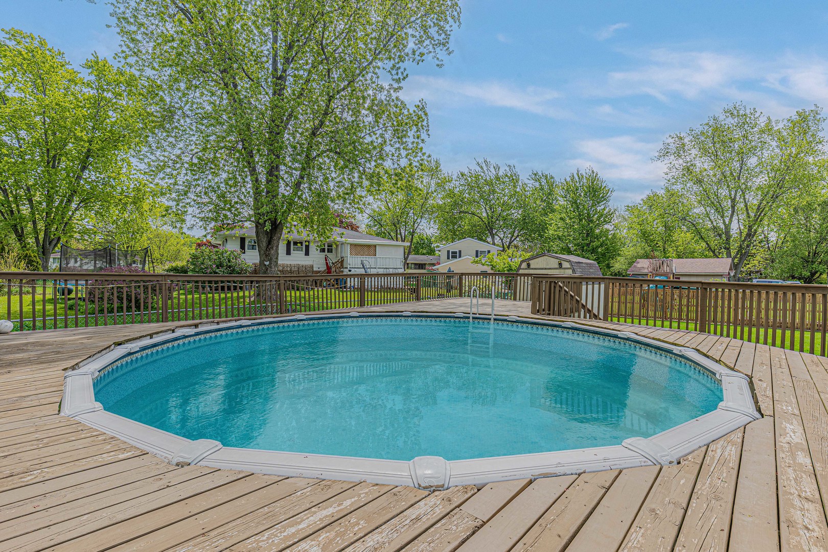 635 Springinsguth Road Schaumburg, IL 60193 - Photo 21 of 26 a view of a swimming pool with a patio
