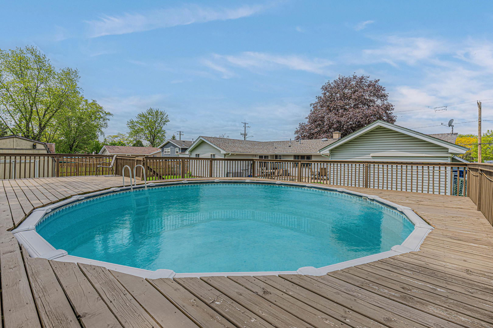635 Springinsguth Road Schaumburg, IL 60193 - Photo 23 of 26 a view of a house with a swimming pool