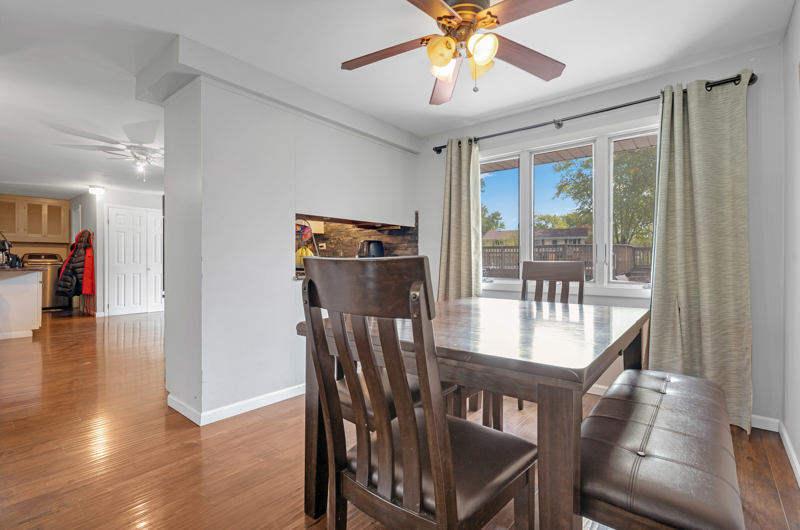 635 Springinsguth Road Schaumburg, IL 60193 - Photo 4 of 26 a view of a dining room with furniture window and wooden floor