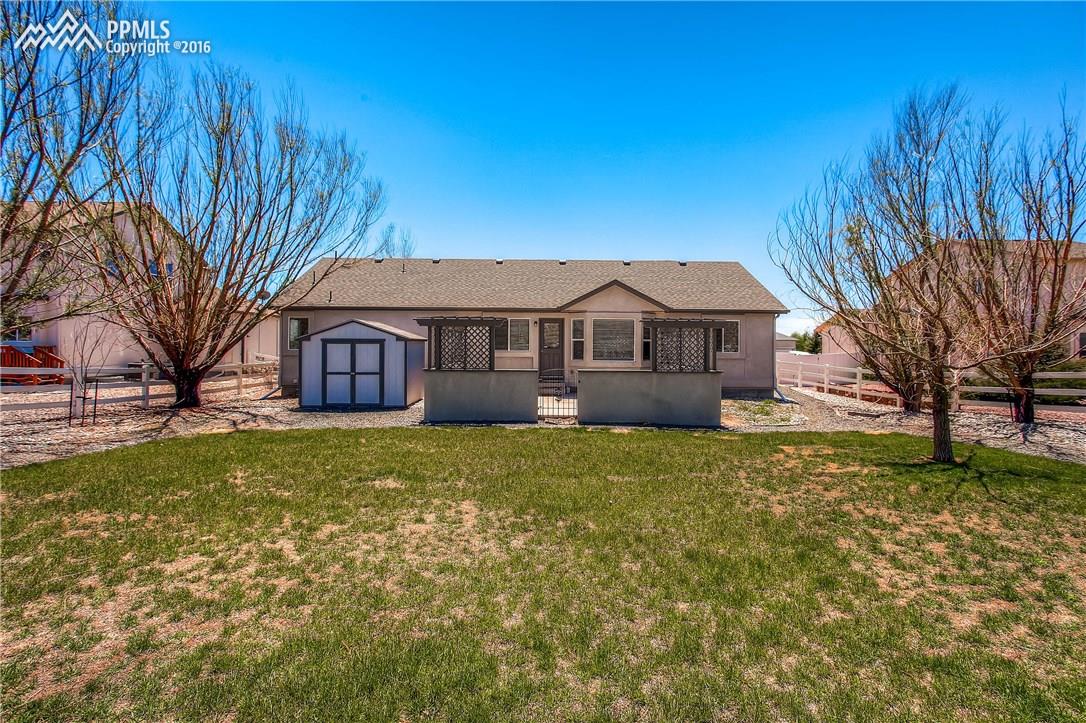 12330 Motley Road Peyton, CO 80831 - Photo 26 of 27 View of the rear of the home...move in ready and has it all!