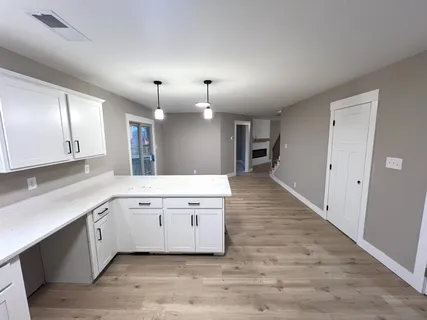 a bathroom with a toilet and a sink