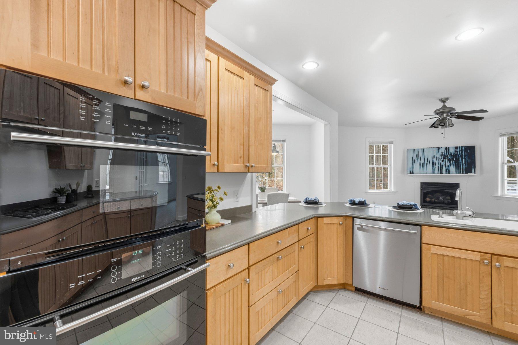 5375 Deale Churchton Road Churchton, MD 20733 - Photo 19 of 47 a kitchen with a sink stove and cabinets