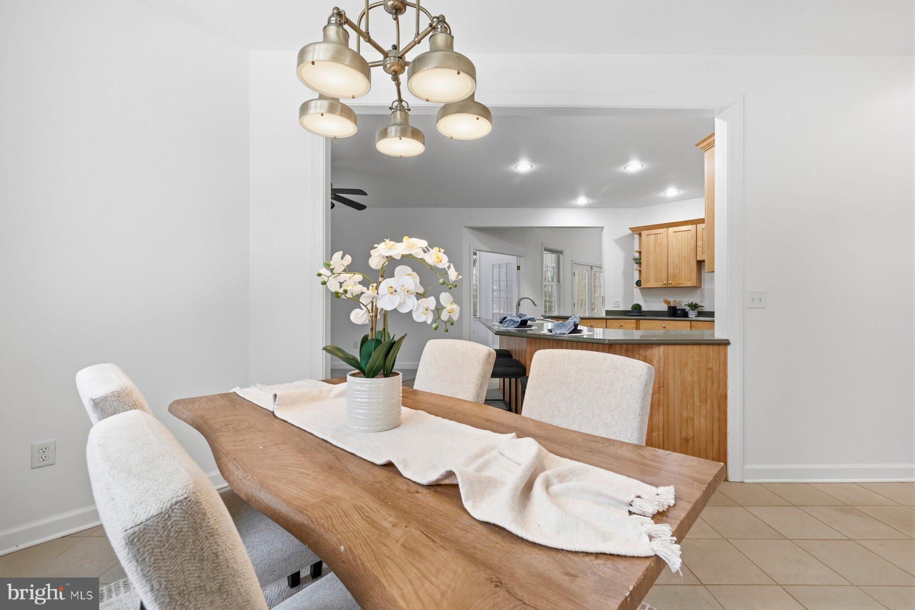 5375 Deale Churchton Road Churchton, MD 20733 - Photo 2 of 47 a dining room with furniture and chandelier
