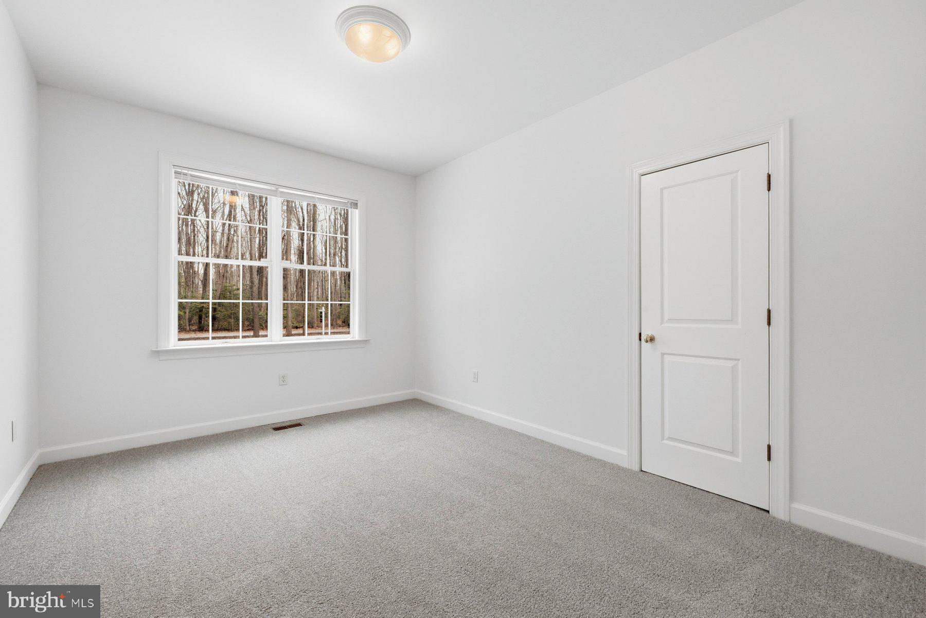 5375 Deale Churchton Road Churchton, MD 20733 - Photo 23 of 47 an empty room with windows
