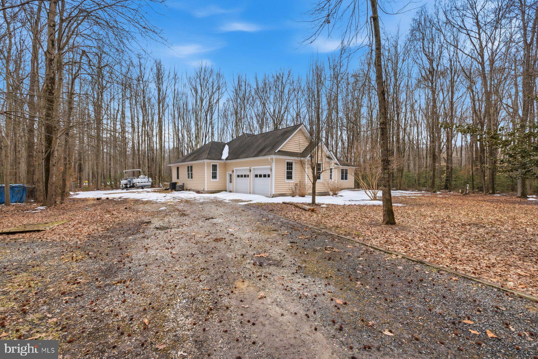 5375 Deale Churchton Road Churchton, MD 20733 - Photo 43 of 47 a house with trees in front of it