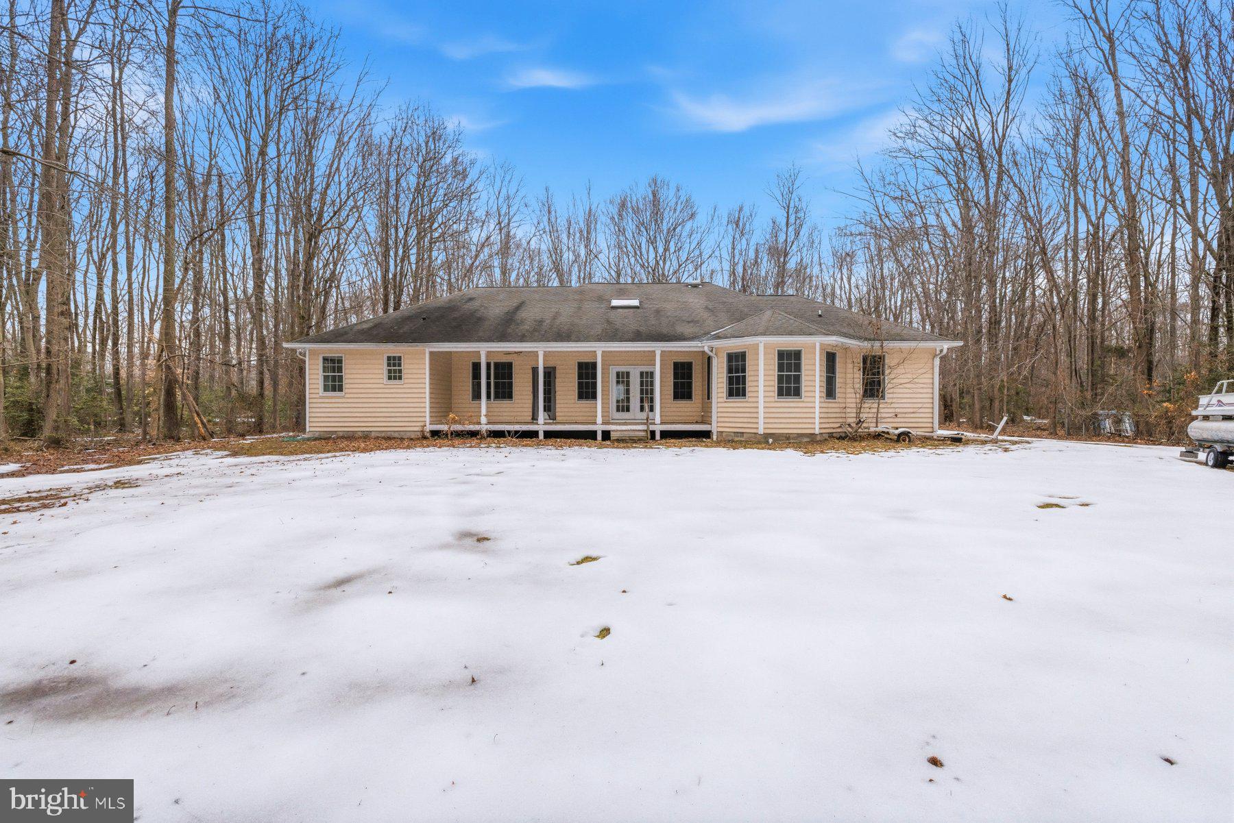 5375 Deale Churchton Road Churchton, MD 20733 - Photo 44 of 47 a view of house with a yard and covered with snow