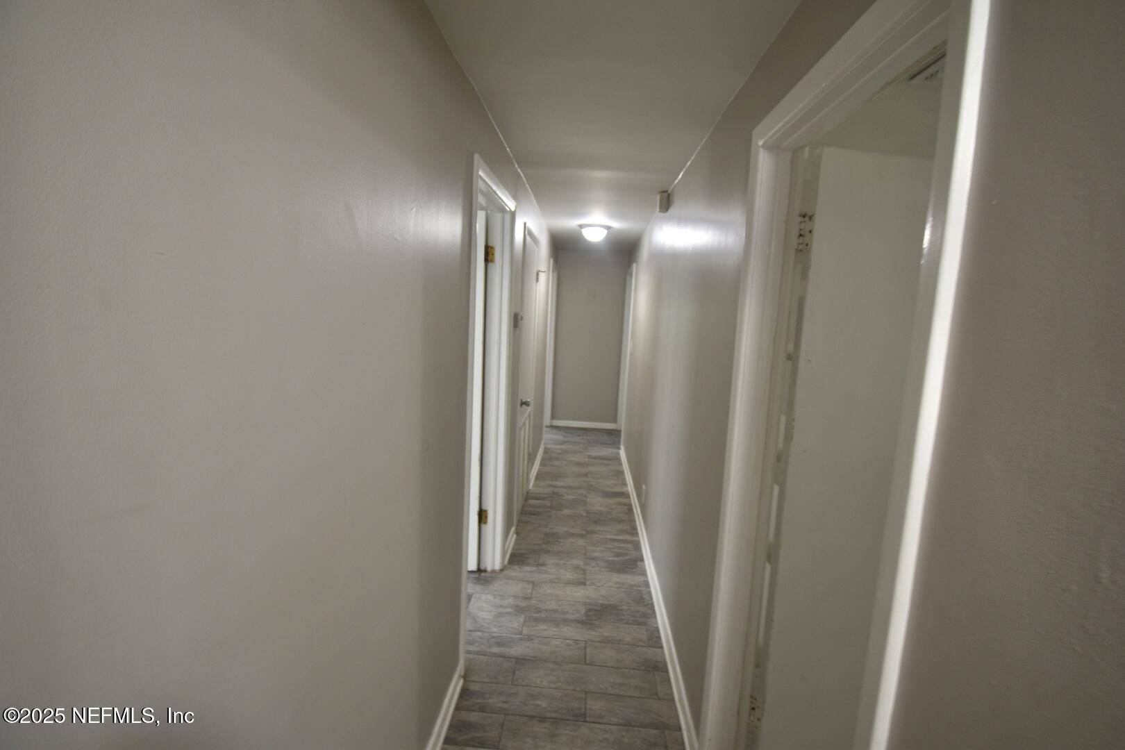 5102 Lambing Road Jacksonville, FL 32210 - Photo 13 of 25 a view of a hallway