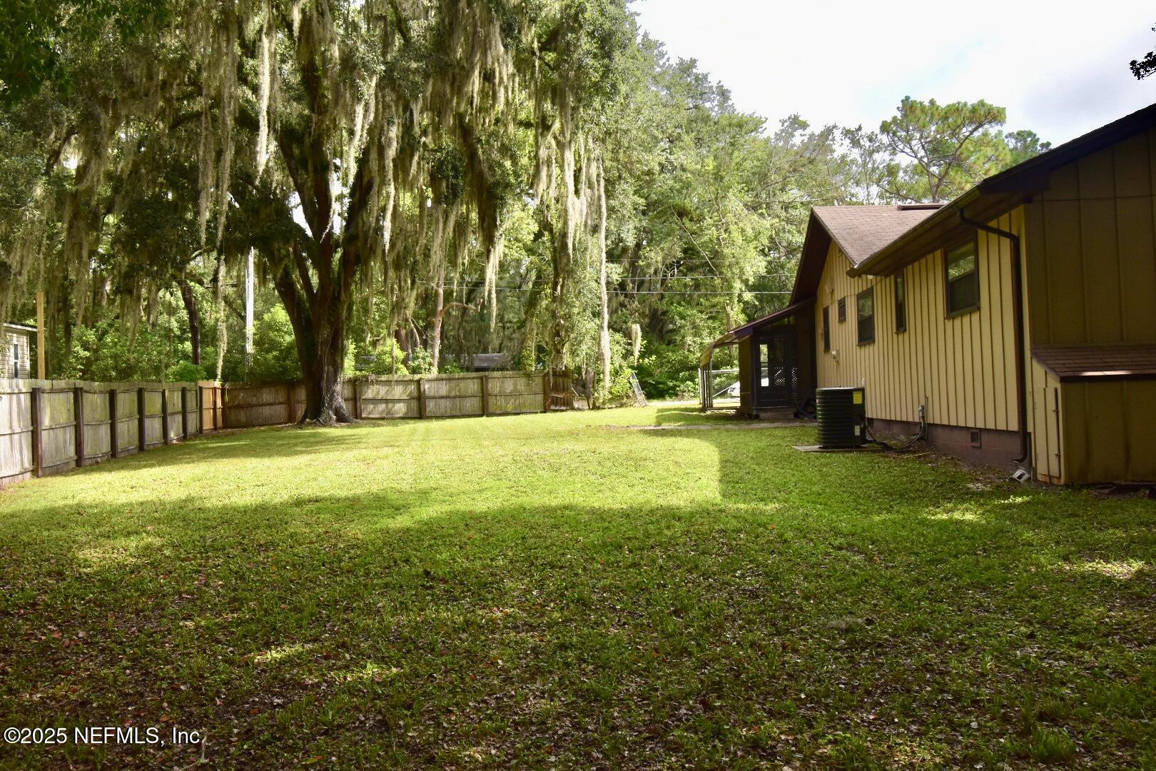 5102 Lambing Road Jacksonville, FL 32210 - Photo 24 of 25 a view of swimming pool with an outdoor space