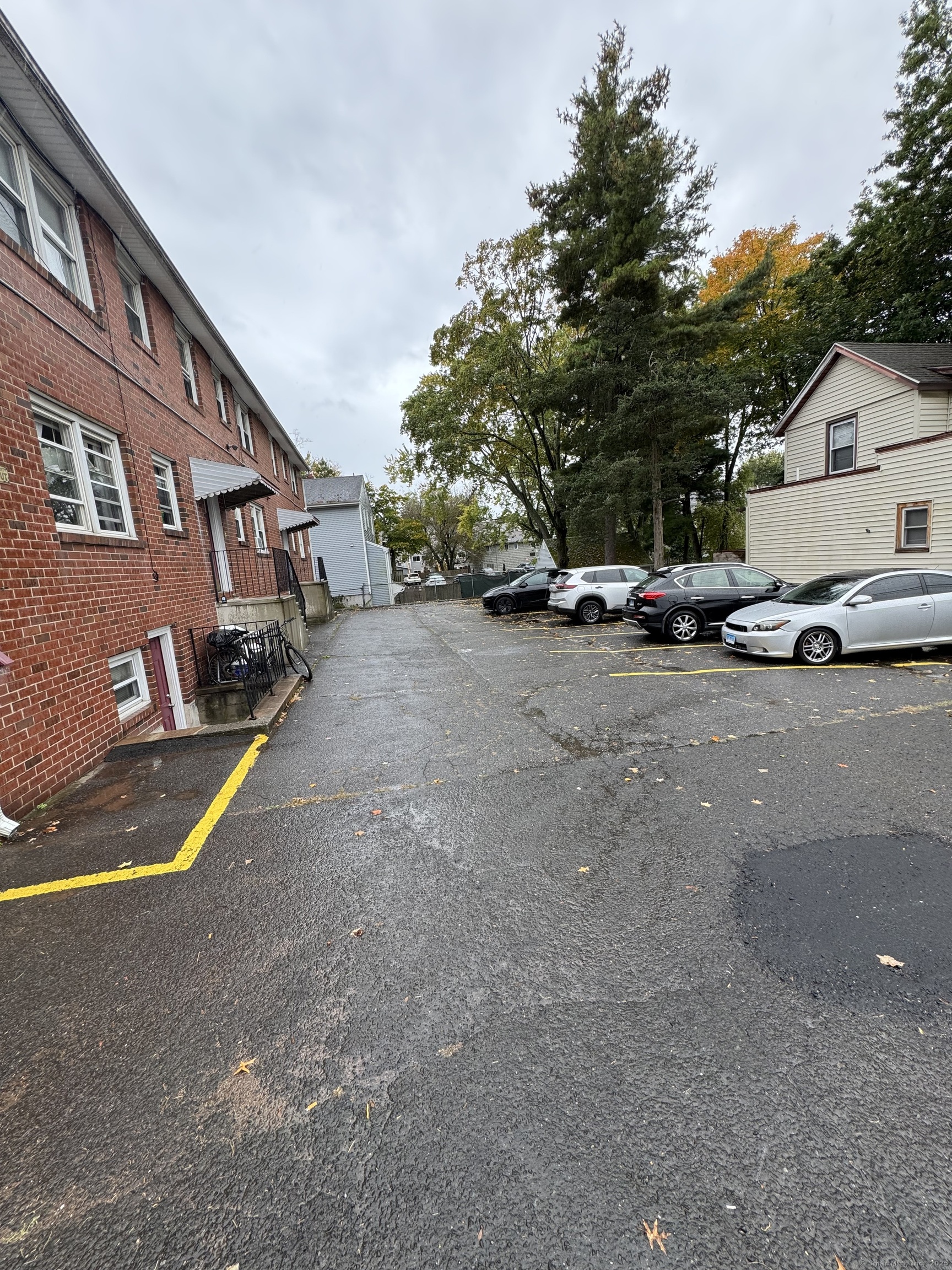 68 Warner Street, Unit B2 Hamden, CT 06514 - Photo 6 of 6 a view of a house with a yard and sitting area