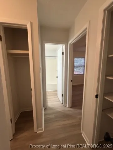 a view of hallway with stairs