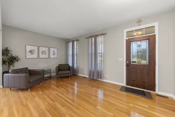a view of livingroom with furniture and windows