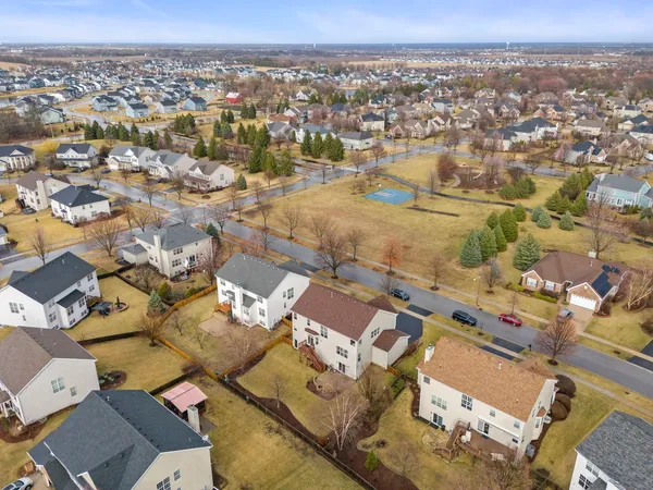 an aerial view of a city with ocean view