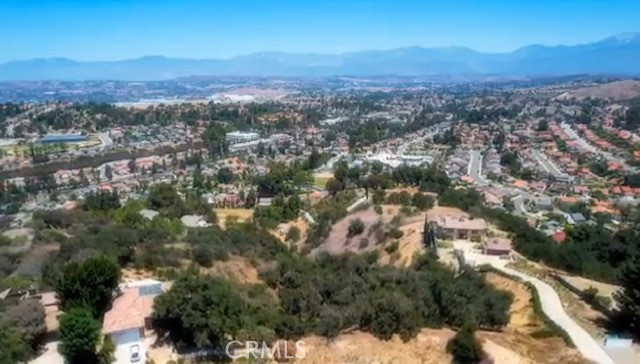 23431 Ridge Line Road Diamond Bar, CA 91765 - Photo 4 of 15 an aerial view of residential houses with city and green space