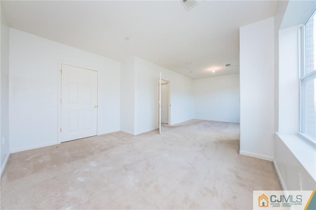 368 Rector Street, Unit 411 Perth Amboy, NJ 08861 - Photo 10 of 14 a view of an empty room